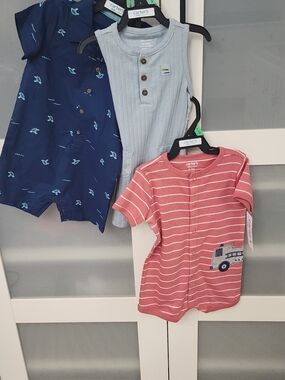 Carter's Baby Short Sleeve Romper Trio in Navy, Light Blue & Coral